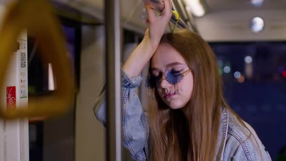 Tired Depressed Stylish Young Woman Stay Alone in Bus Transport After Hard Work Day Falls Asleep alt