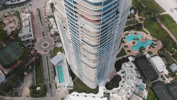 Aerial View of Beach Strip with Condo and Resort alt
