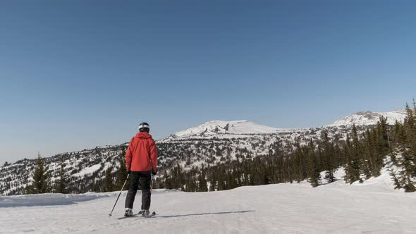 Skier Slides On Skis On Snowy Mountainside Enjoying Winter And Nature alt