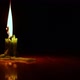 a candle burning in the dark, beautiful fire of a candle in a dark room - VideoHive Item for Sale