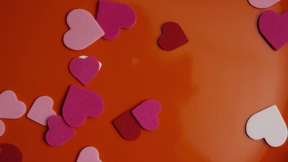 Rotating stock footage shot of Valentines decorations and candies - VALENTINES 0094 alt