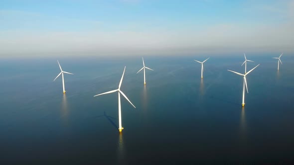 Windmill Park in the Ocean Drone Aerial View of Windmill Turbines Generating Green Energy Electric alt
