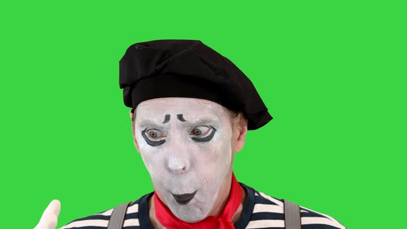 Mime Blowing an Imaginary Balloon on a Green Screen Chroma Key alt