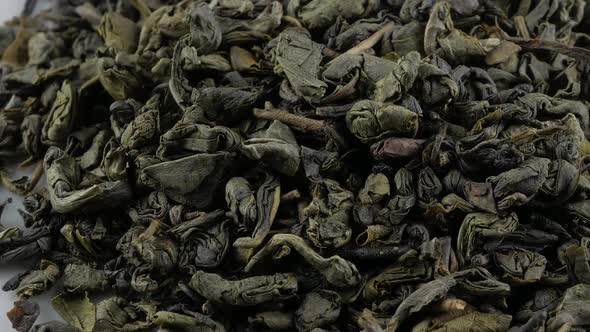 Tea herbs texture. Green tea. Organic dried green tea leaves.