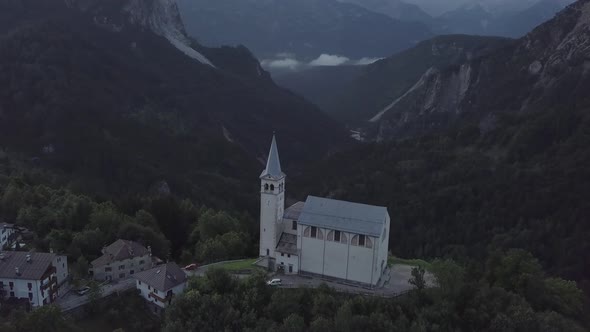 Aerial view of church in Italian Alps Dolomites South Tyrol region Italy mountains valley forest