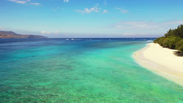 Paradise exotic beach of tropical island with white sand washed by blue sea and turquoise lagoon wit alt