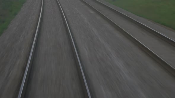 High Speed Passenger Train in Motion on Railroad