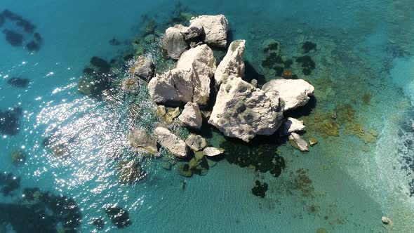 Lonely Rock in the Sea High Cliff of a Rocky Mountain Waves in a Blue Ocean Concept Calm Sea alt