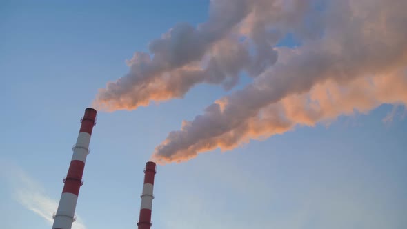 Factory Smokestacks Emitting Smoke Against Sky  Environmental Pollution