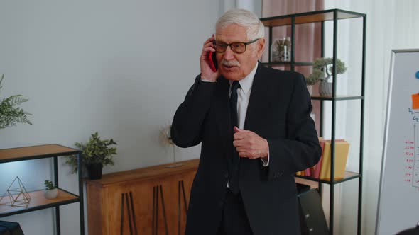 Angry Senior Business Man Making Phone Call at Office Work Annoyed Boss Talking Mobile Quarrel alt