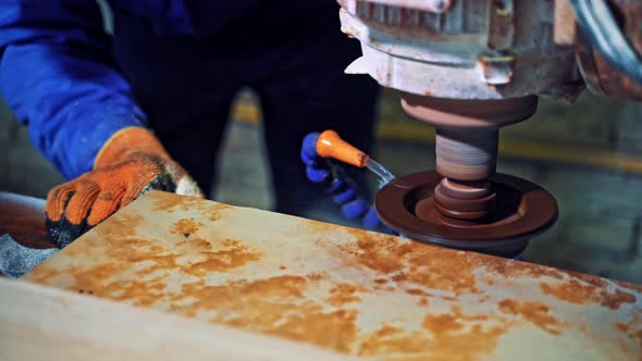 Industrial marble cutting factory. Man professional worker cutting tile with circular saw alt