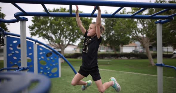 Athletic Girl On Monkey Bars