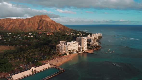 Aerial drone footage of Honolulu, Hawaii. Beautiful real estate, buildings in the city. Palm trees alt