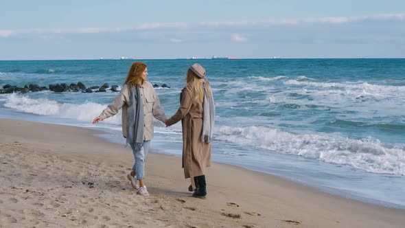 Beautiful Girls Walk Near the Sea alt