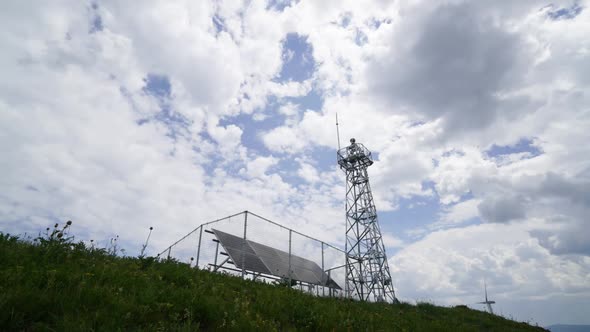 Solar power and wind power Clouds flow quickly alt