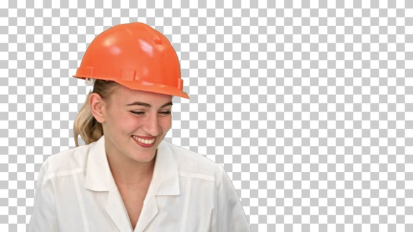 Young female construction engineer smiling, Alpha Channel