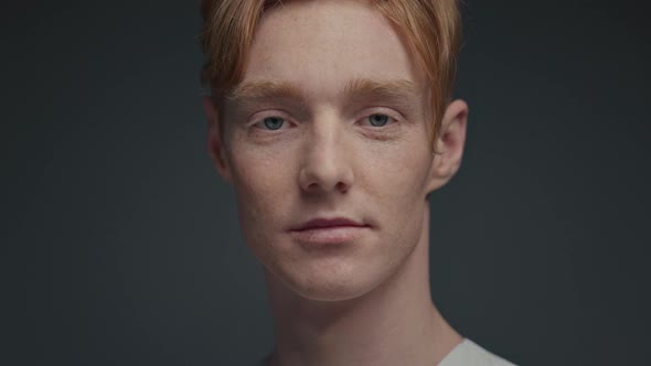 Portrait Of Young Guy With Red Hair alt