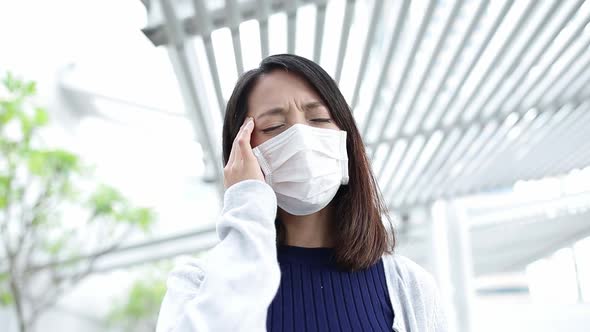 Woman feeling sick at outdoor
