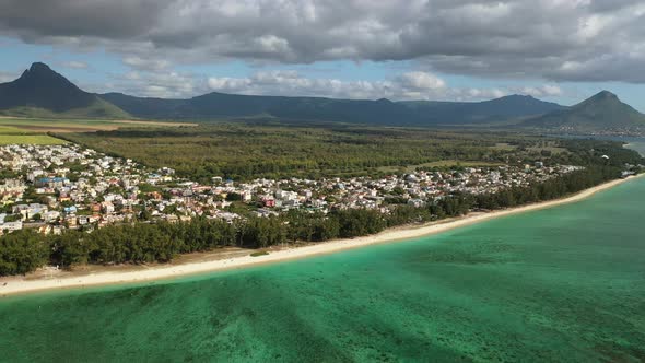 Bird's Eye View of a Suburb with a Beautiful White Beach on the Island of Mauritius