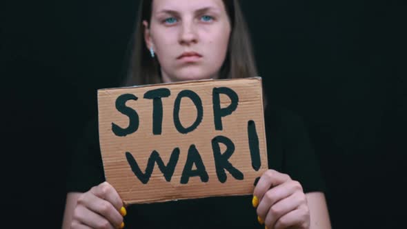 Upset Ukrainian Poor Girl Protesting Against the Military Conflict alt