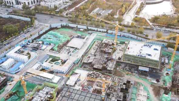 Overhead View Of Tower Crane Construction In Real Estate Development Of Urban Construction alt