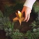 Burning candle in christmas wreath on rustic table, top vie - VideoHive Item for Sale