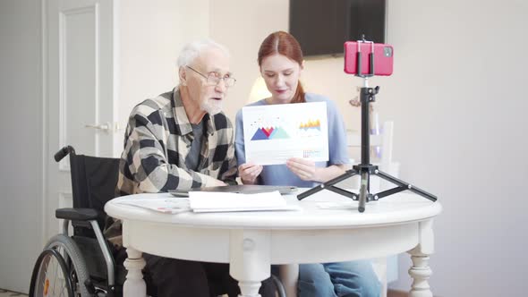 A Woman Sits with Her Grandfather and Together They Tell Their Business Ideas