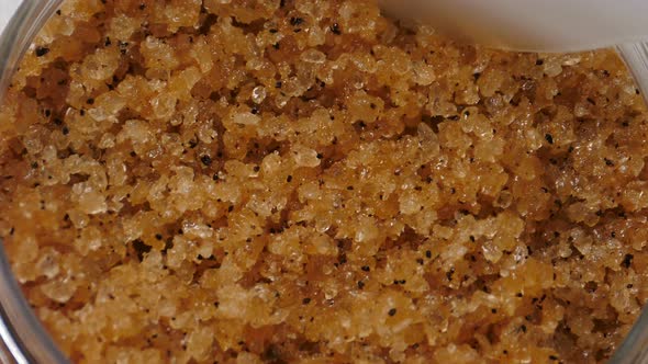 Beauty Salt Scrub Texture Closeup Beautician Taking Natural Product with Spatula alt