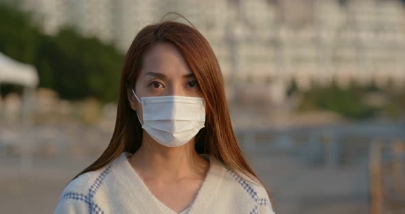 Woman wear face mask for protection