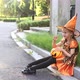 Cute Little Caucasian Girl with Blonde Hair Seven Years Old in Costume of Witch with Hat and Black - VideoHive Item for Sale