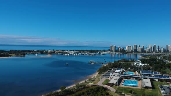 Aerial view showing Australia's Gold Coast waterways and urban sprawl on a clear day alt