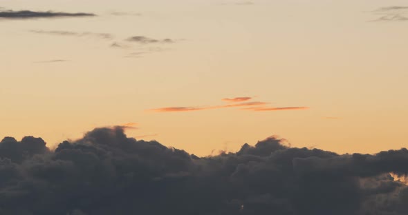 Timelapse of Clouds Forming During Sunset alt