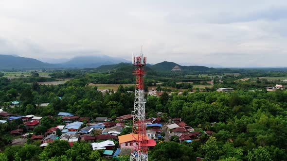 Telecommunication Antenna Tower With 5G And 4G Base Network Aerial View. alt