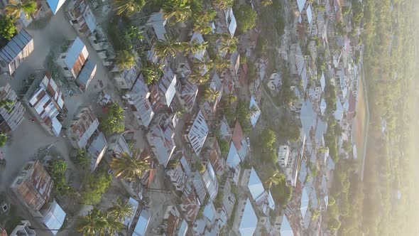 Tanzania  Aerial View of Houses Near the Coast of Zanzibar Vertical Video alt