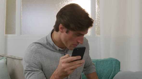 Caucasian man doing online shopping alt