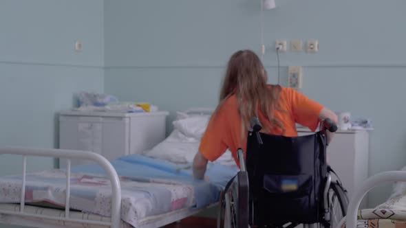 Young Guy a Disabled Person with a Lesion of the Spinal Cord alt