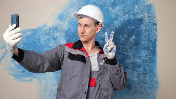 Repair Blogger Makes Gestures with Hand and Shoots Video alt