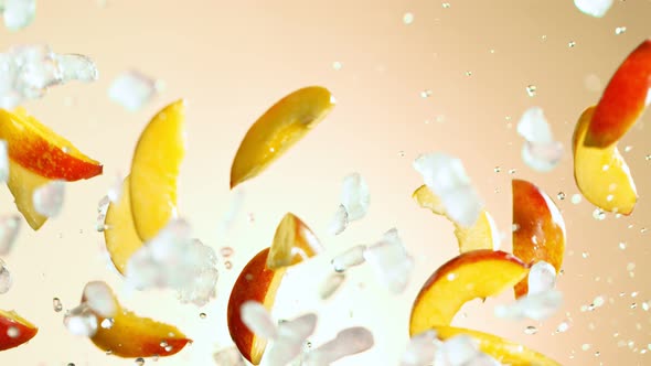Super Slow Motion Shot of Flying Fresh Peach Slices and Crushed Ice at 1000 Fps. alt