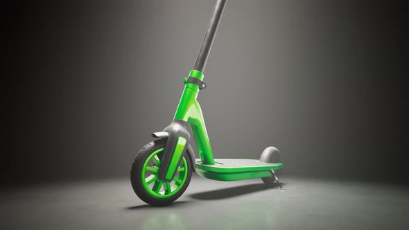 Green electric scooter standing in a spotlight. A modern way of city travel 4KHD alt