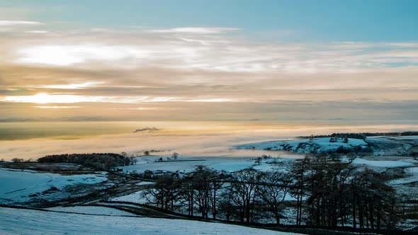 Cloud inversion covering the Eden Valley in Cumbria with the Lakeland mountains in the background, a alt