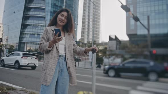 Portrait of Young Businesswoman Making Phone Call During Business Trip alt