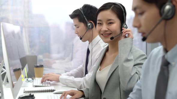 Beautiful customer service telemarketing Asian woman smiling