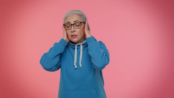Dont Want to Hear and Listen Irritated Elderly Woman Covering Ears Gesturing No Avoiding Advice alt