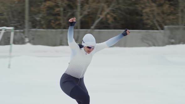 Female Speed Skater Finishing First alt