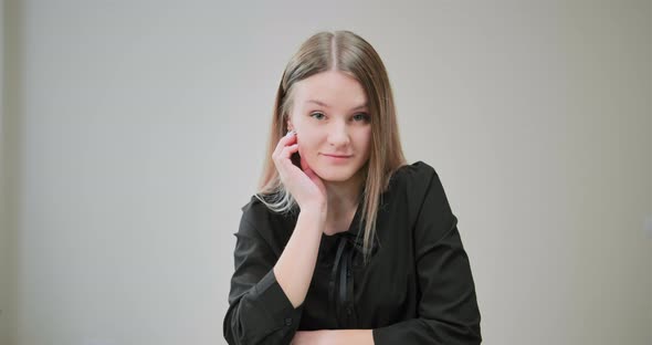 Professional Employer Listens to People and Nods with Smile alt