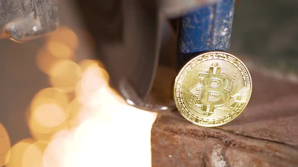 Worker Use Electric Grinder Cutting Bitcoin Coin