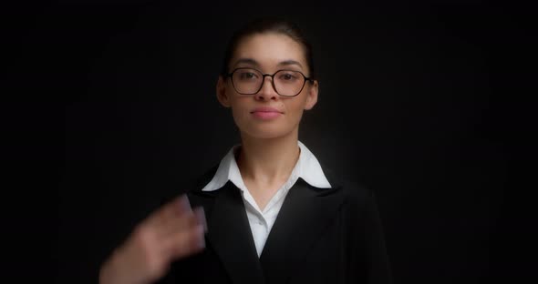 Business Woman with Glasses with a Serious Face Shows Three Finger
