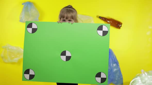 Girl Activist Holding Chroma Key Poster with Tracking Points. Environment Trash Plastic Pollution alt