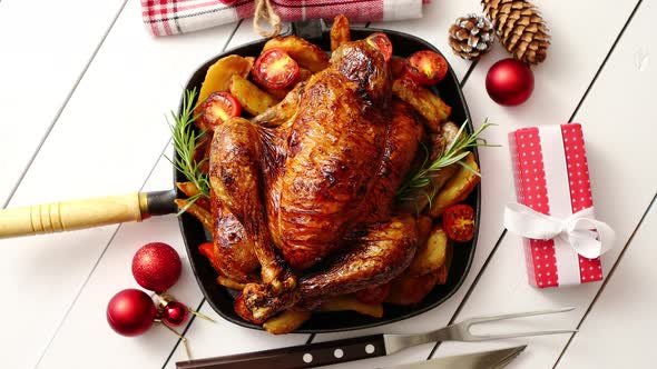 Top View of Baked Whole Chicken or Turkey Served in Iron Square Pan alt