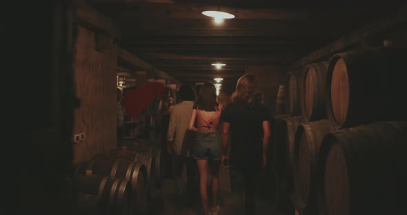 Friends get tour of wine cellar alt